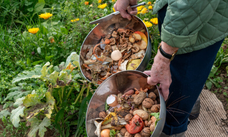 Gardener Transforms Old Wooden Boards Into a Functional DIY Compost Bin